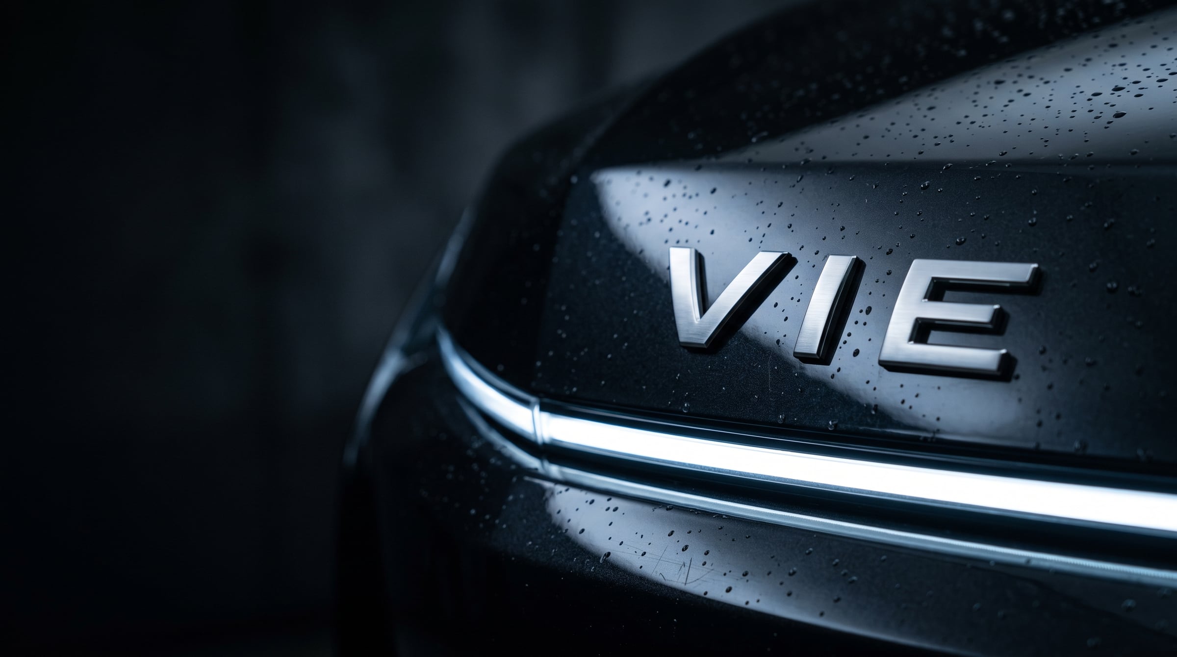 VIE badge on the front of a VIE electric car